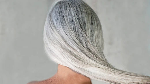 What causes grey hair in your 20s?